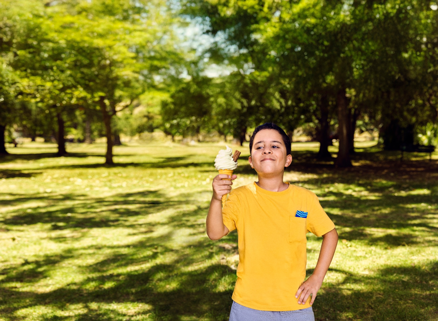 Young Leinster supporter enjoying an ice cream on a sunny day